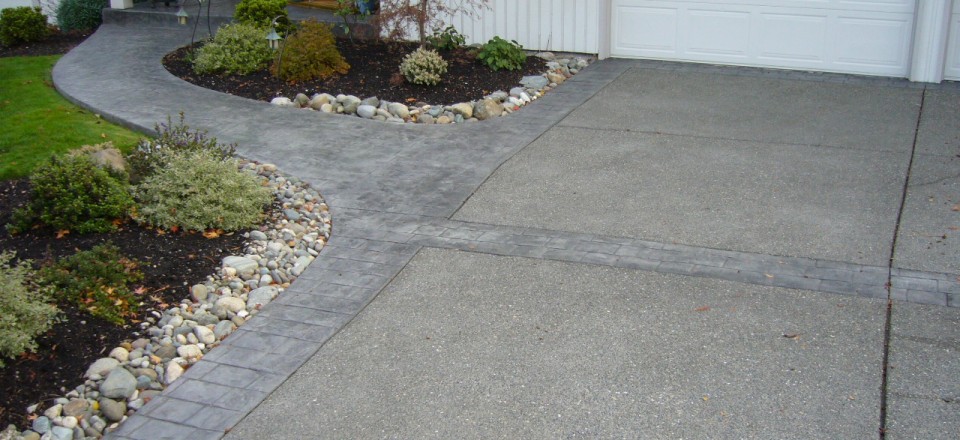 Exposed Driveway With Stamped Borders and Walkway